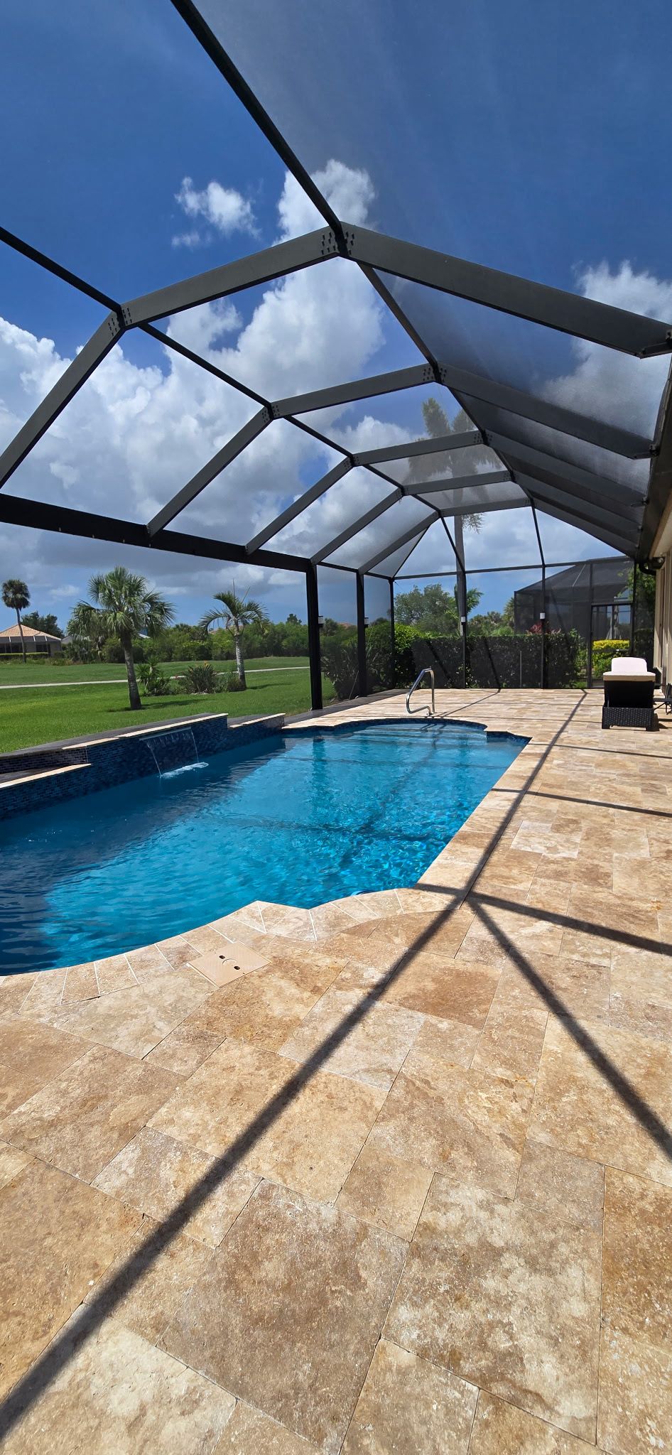 After pool deck transformation - travertine pavers