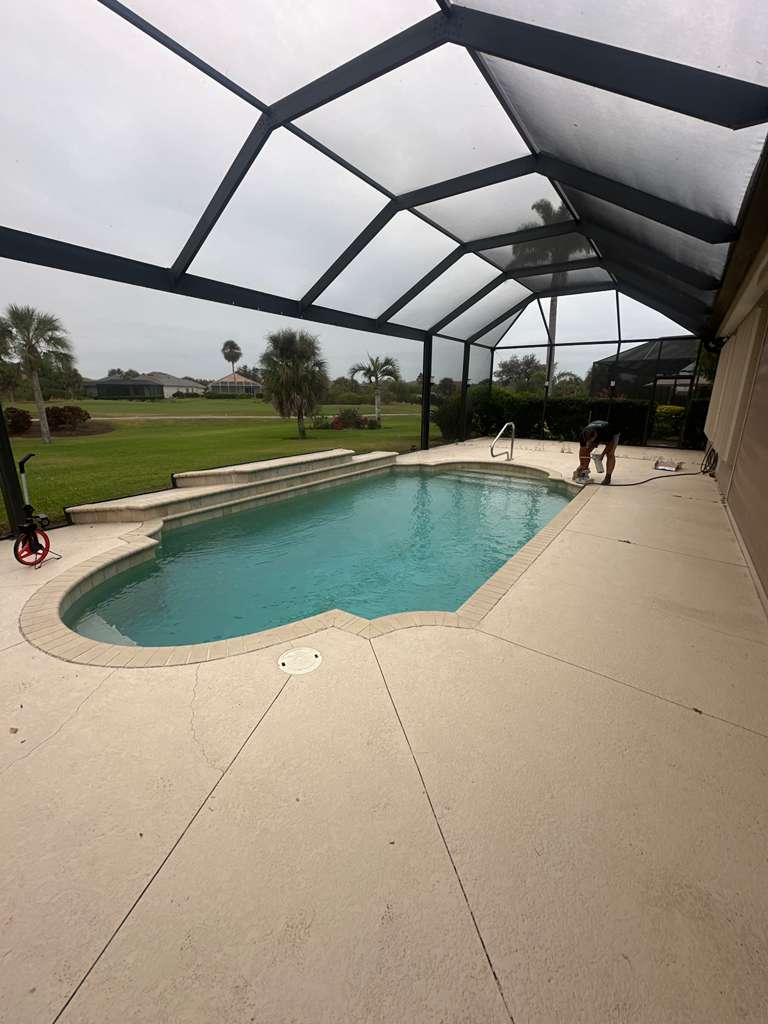 Before pool deck transformation - cracked concrete