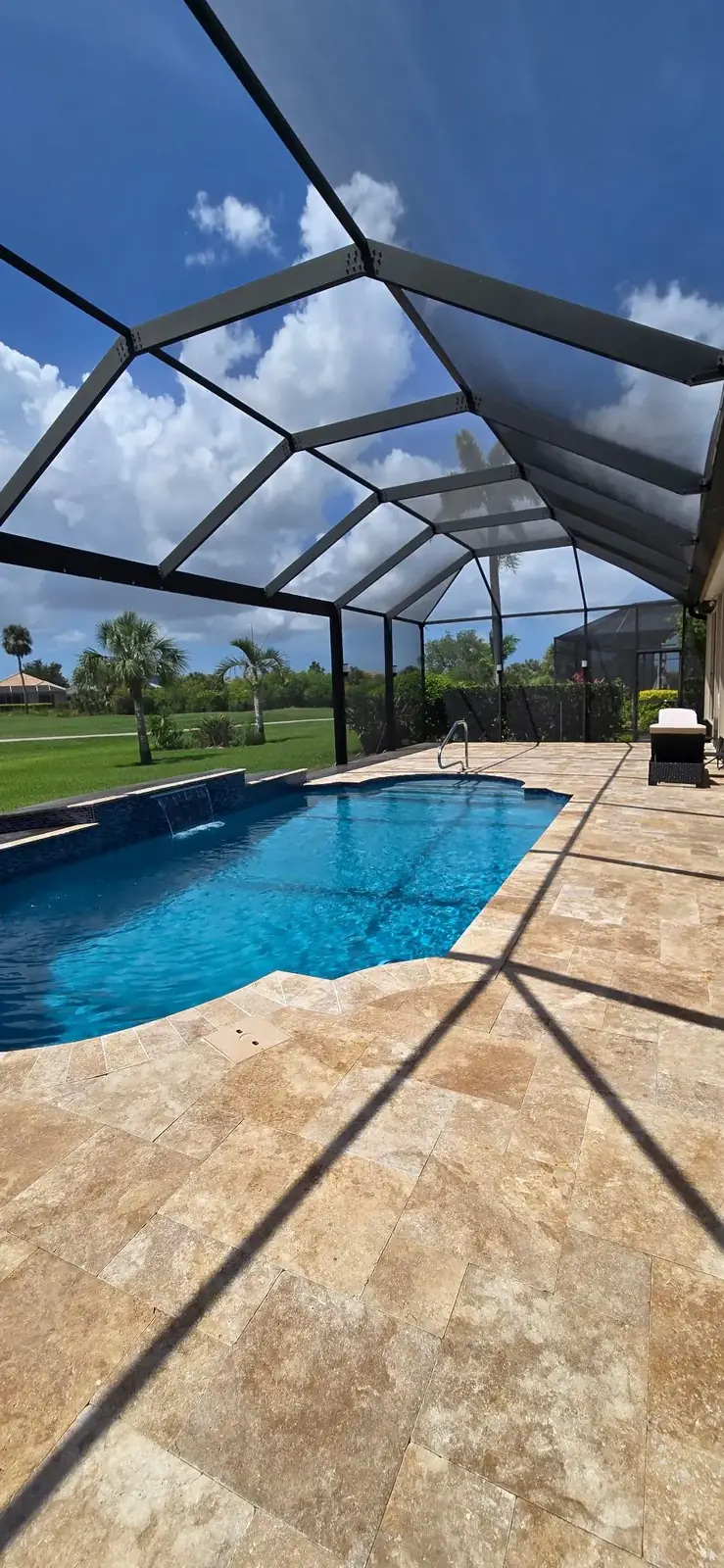 After: new travertine paver pool deck