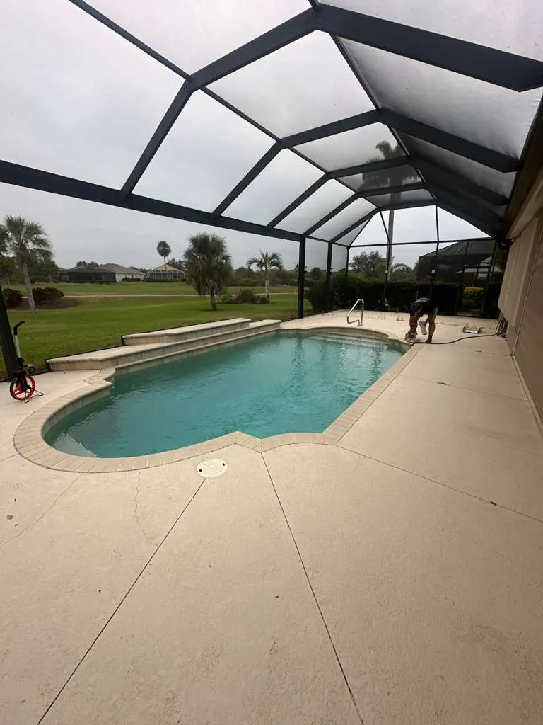 Before: cracked, weathered concrete pool deck